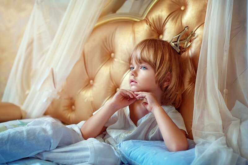 Child in Bed with Crown