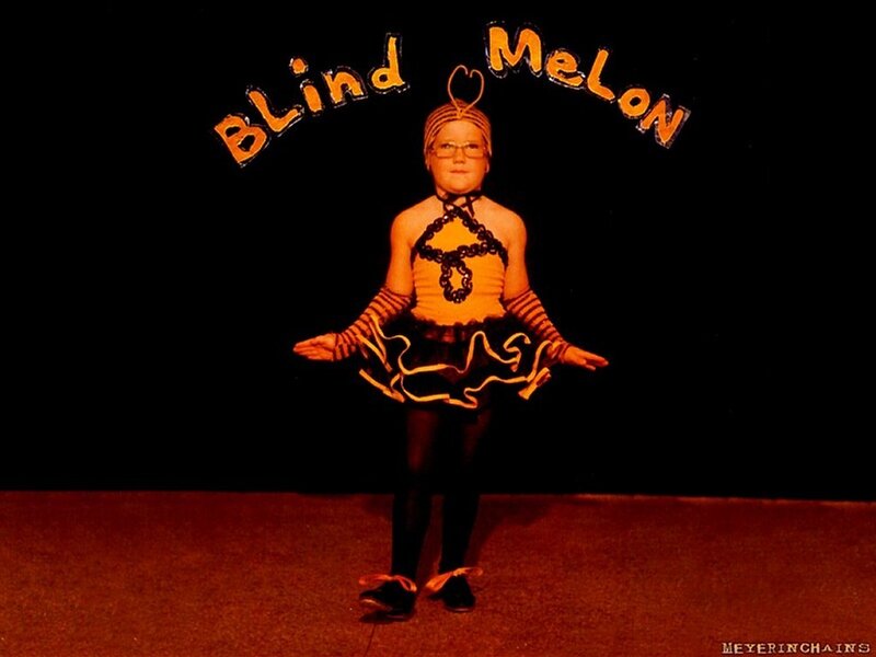 child in bee costume on stage