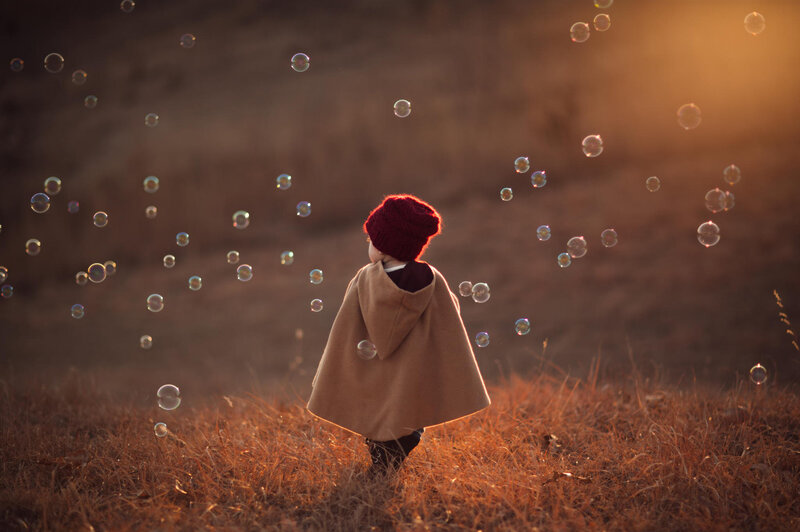 Child in Cape and Hat