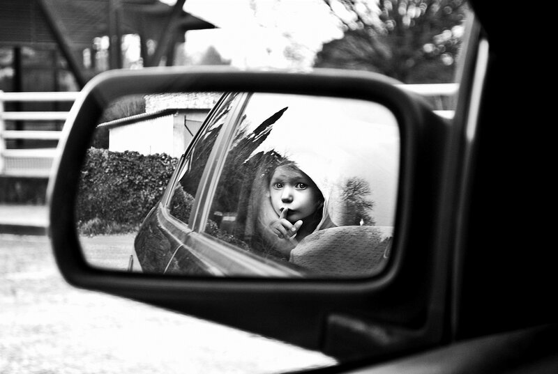 Child in Car Mirror