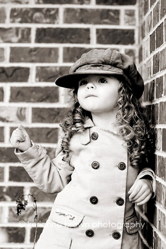 child in coat and cap