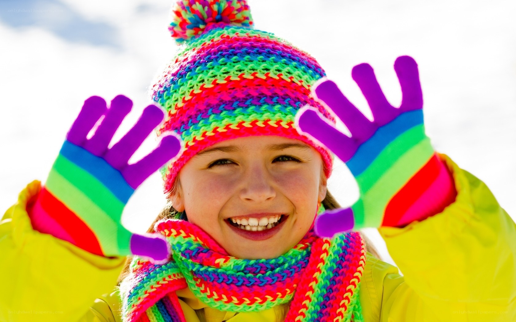 child in colorful winter gear