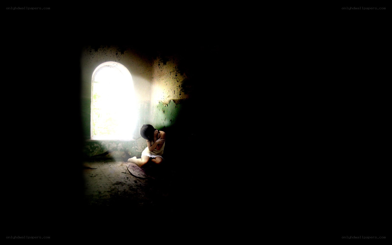 child in dark room by window