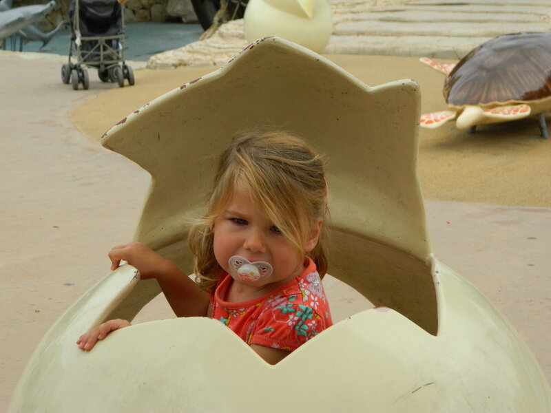 Child in Egg Sculpture