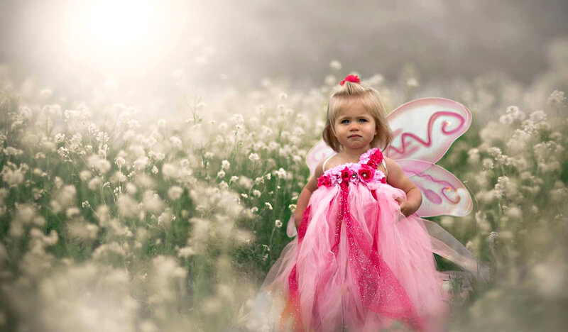 Child in Fairy Costume — Pink, Serene, Afternoon