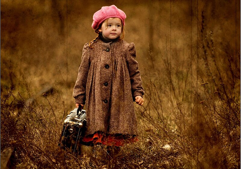 Child in Field — Brown
