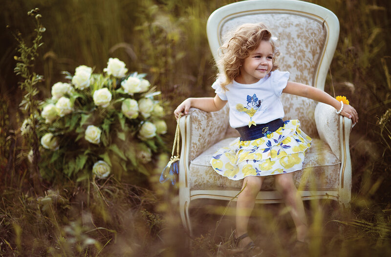 Child in Floral Dress — Yellow