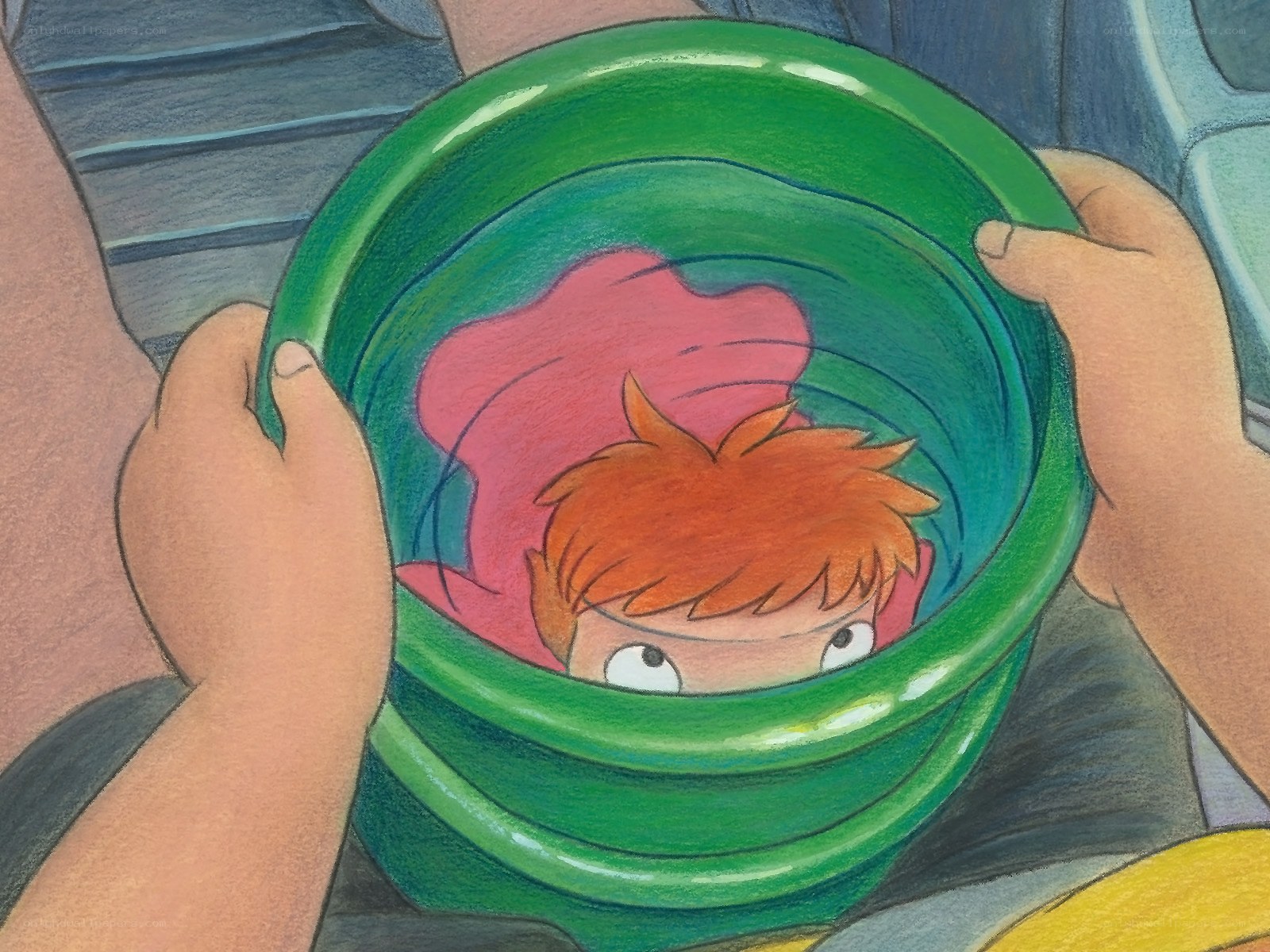 child in green bucket