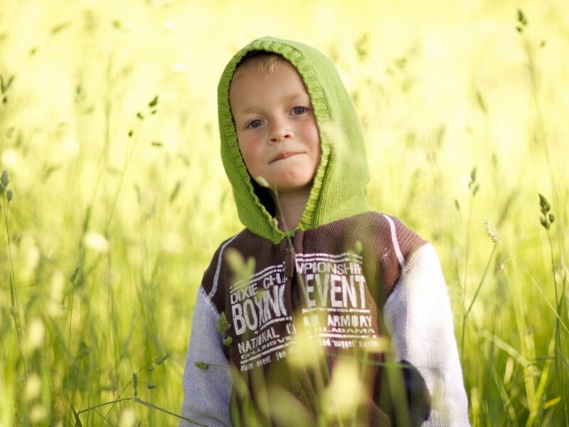Child in Green Hoodie — Serene