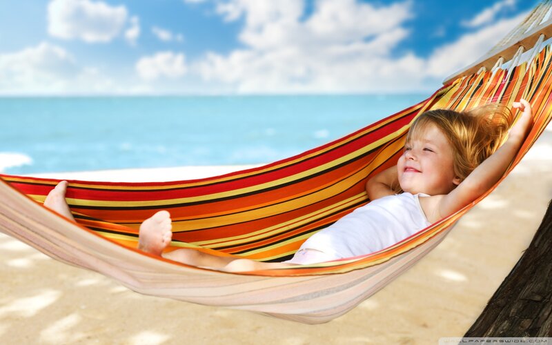 Child in Hammock — Blue, Relaxed