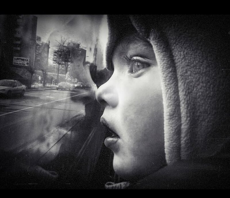 Child in Hooded Jacket — Black, Dramatic
