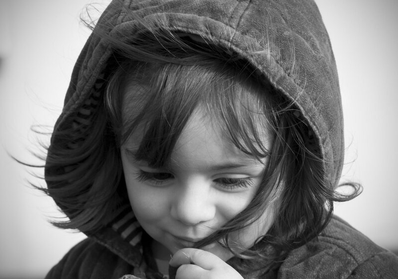 Child in Hooded Jacket — Black