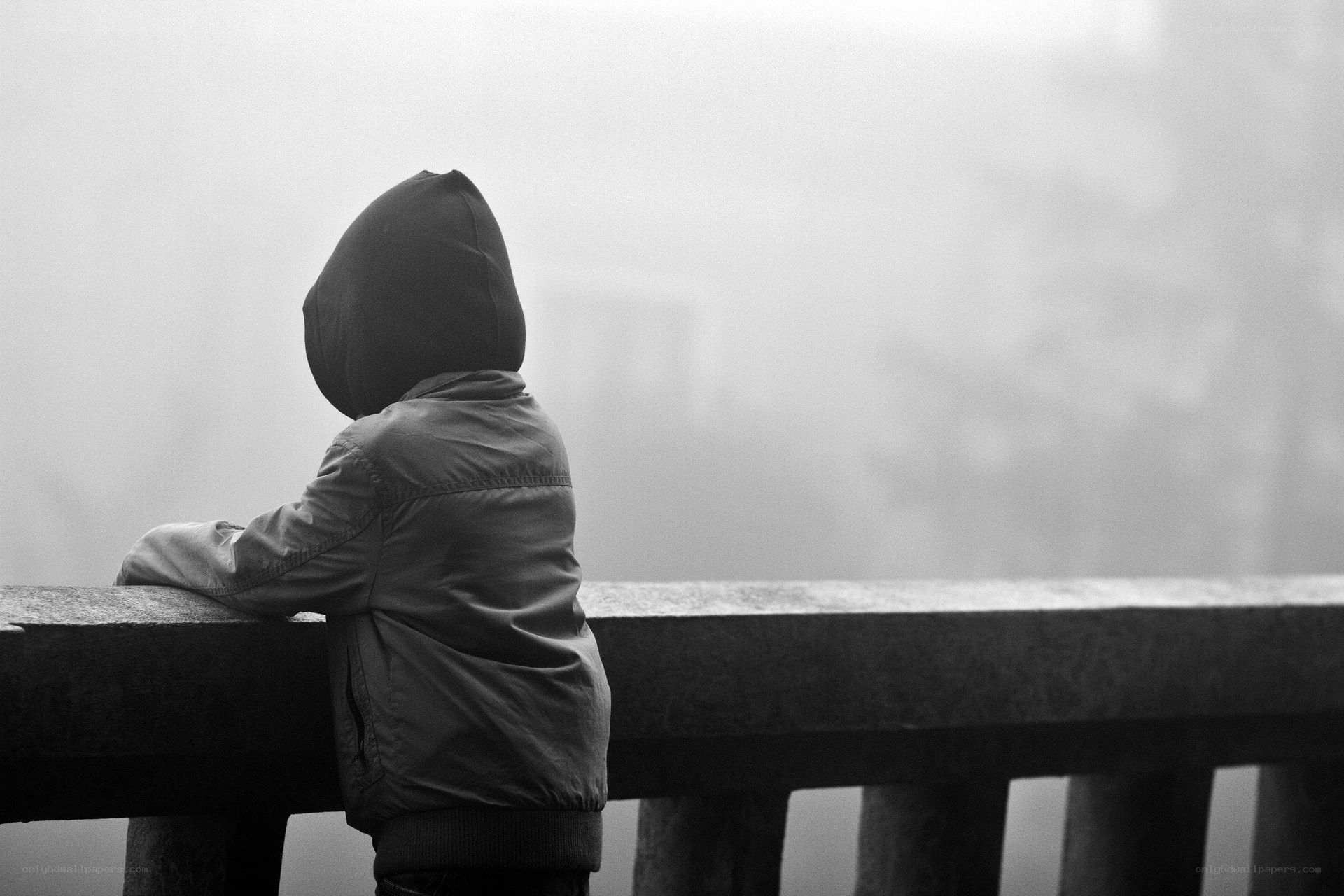 child in hooded jacket