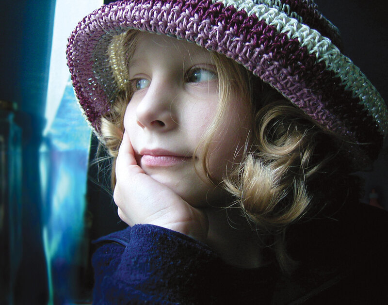 Child in Knitted Hat — Purple
