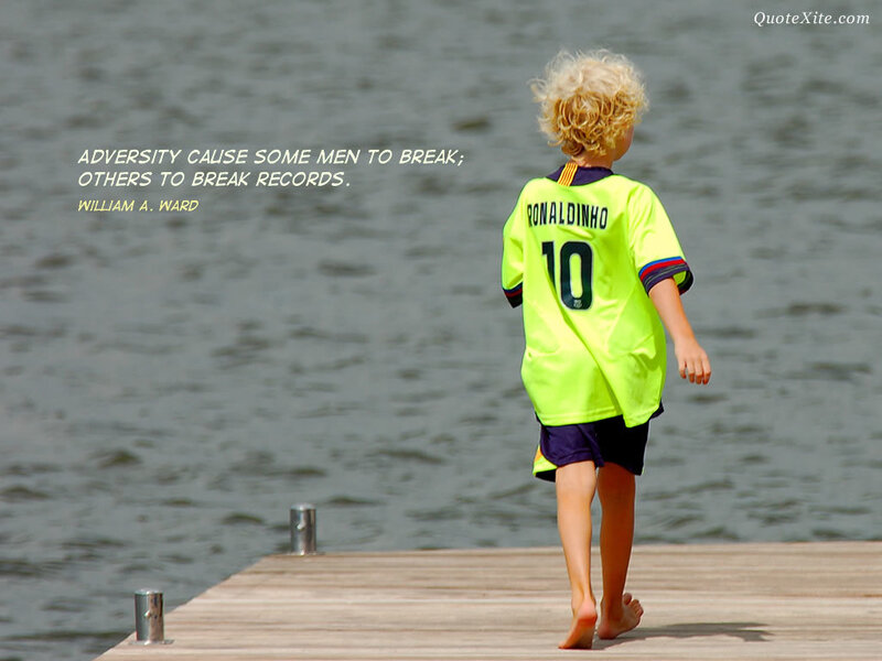 child in neon jersey on dock