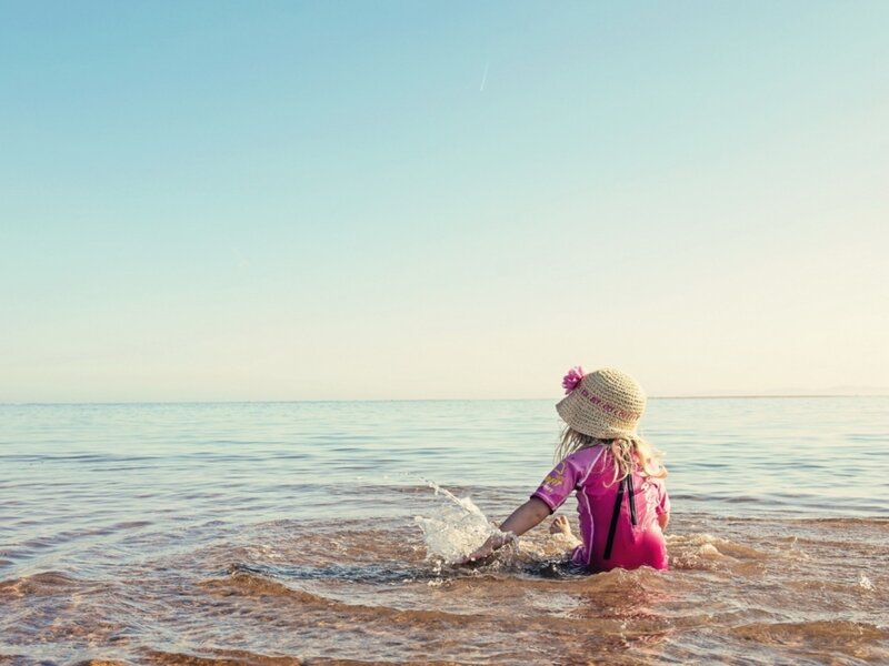 Child in Ocean Water