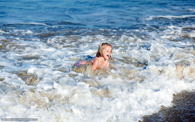 Child in Ocean Waves