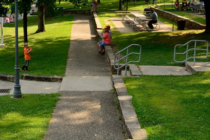 Child in Orange Shirt