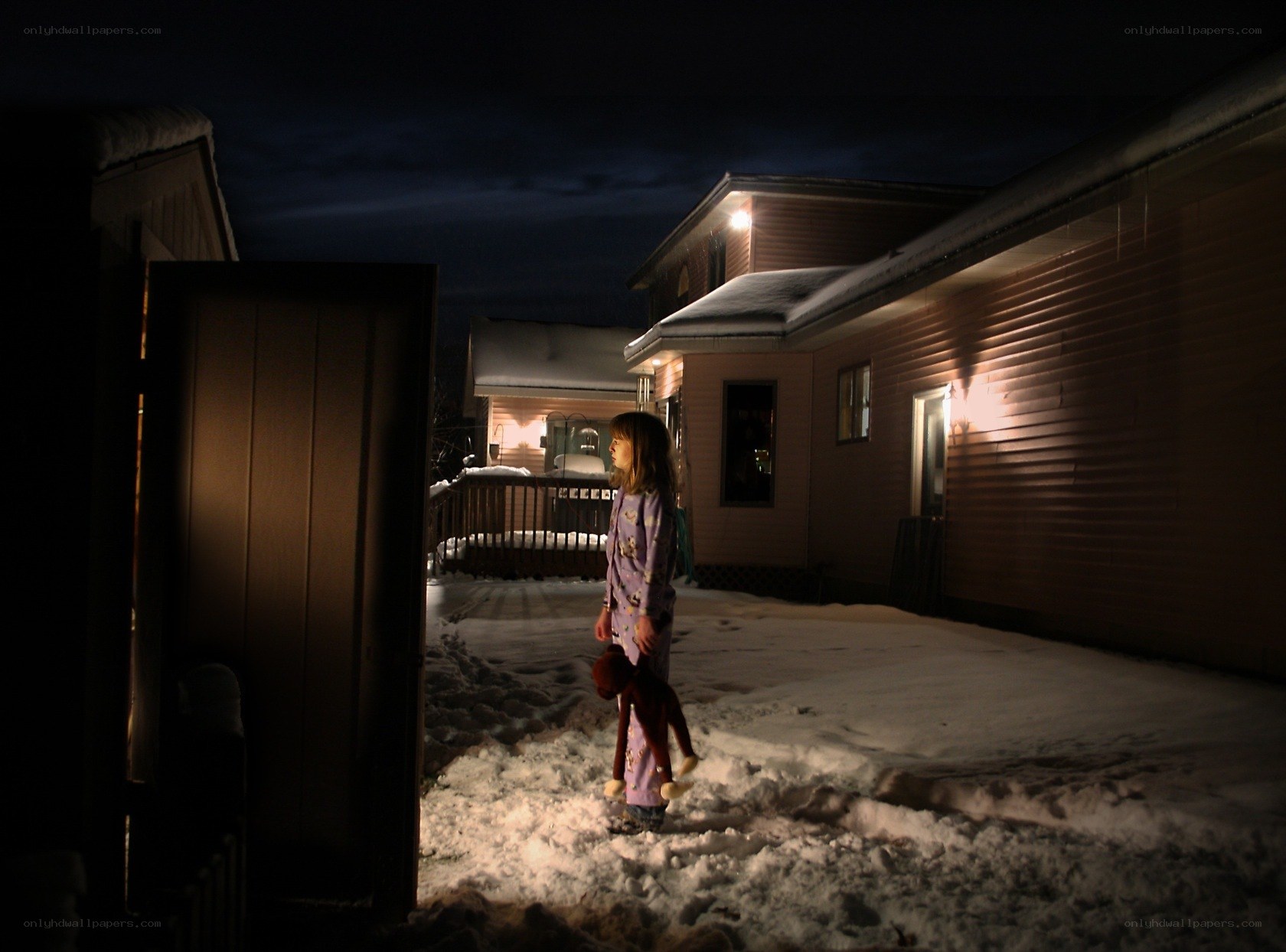 Child in pajamas at night