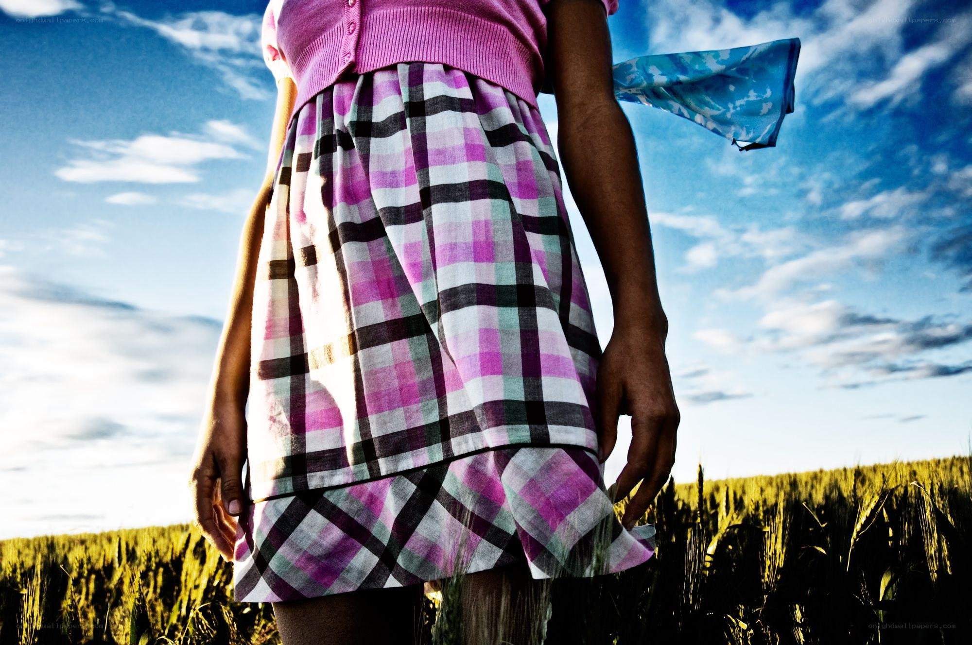 Child in plaid skirt