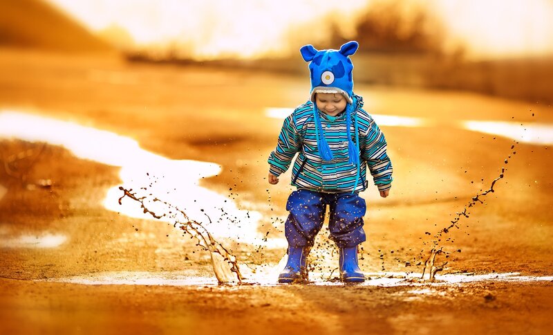 Child in Rain Boots — Blue
