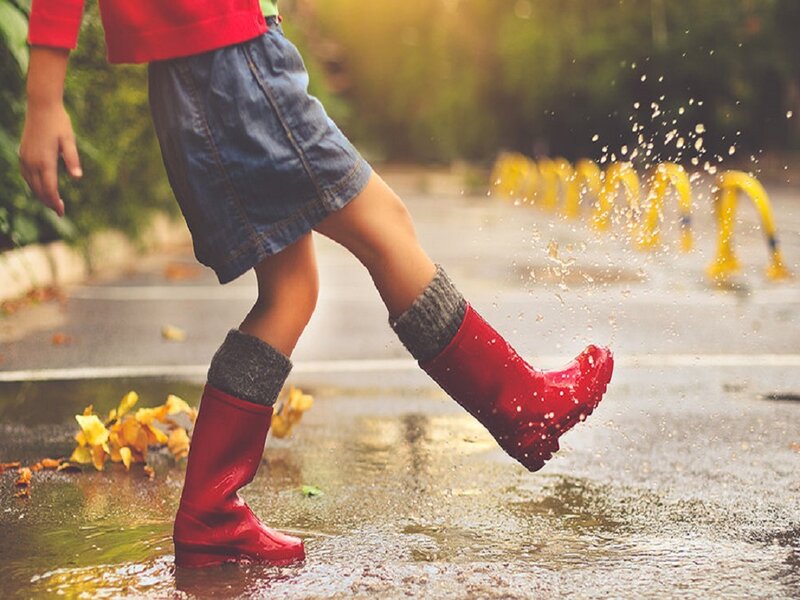Child in Rain Boots