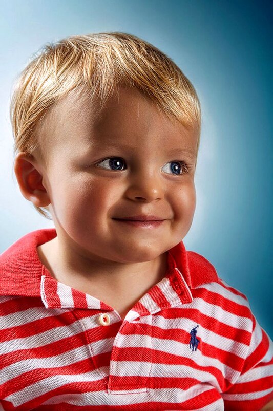 child in red and white striped shirt