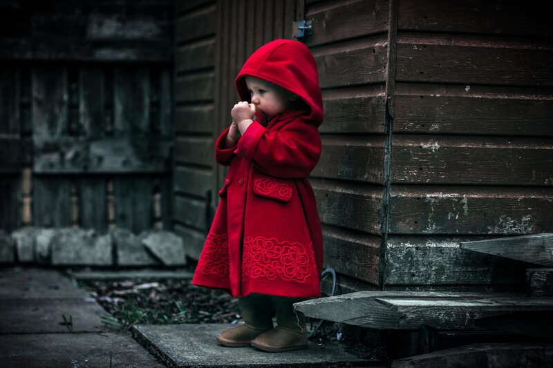 Child in Red Coat — Dramatic