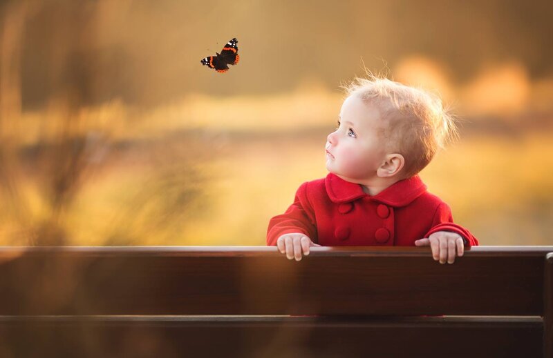 Child in Red Coat — Serene