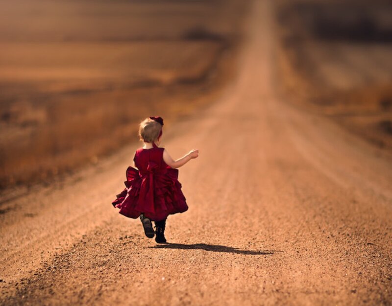 Child in Red Dress — Serene, Sunset
