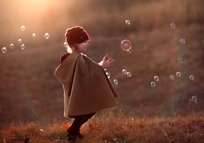 Child in Red Hat — Brown