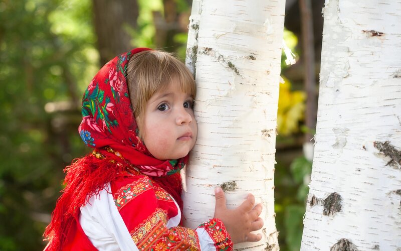 Child in Red Headscarf — Serene