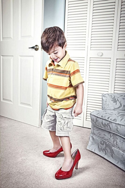 child in red high heels