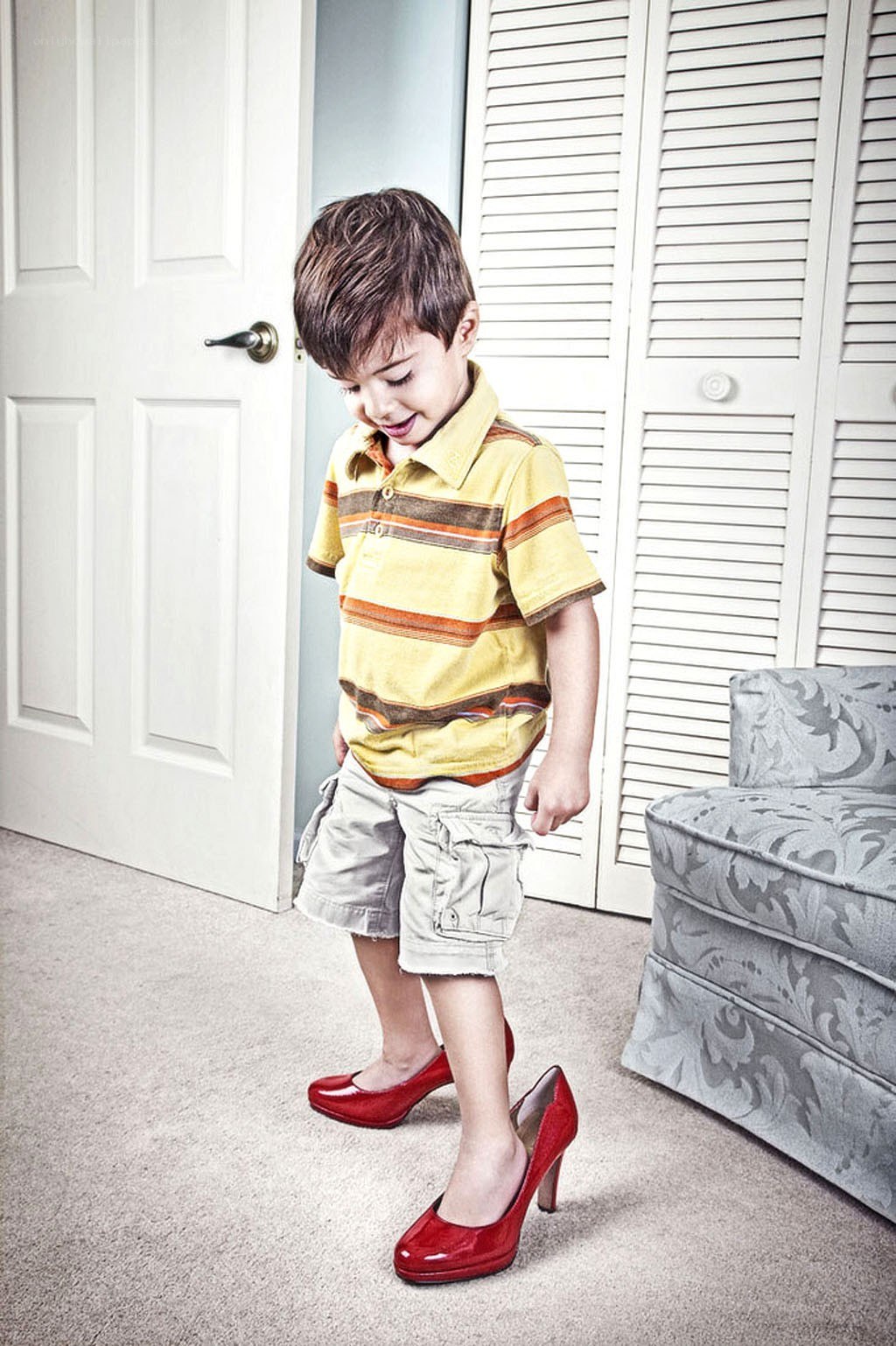 child in red high heels