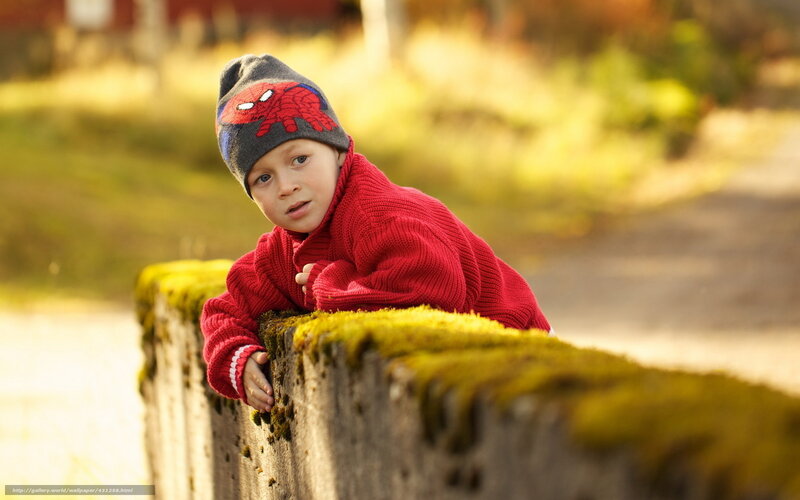 child in red sweater