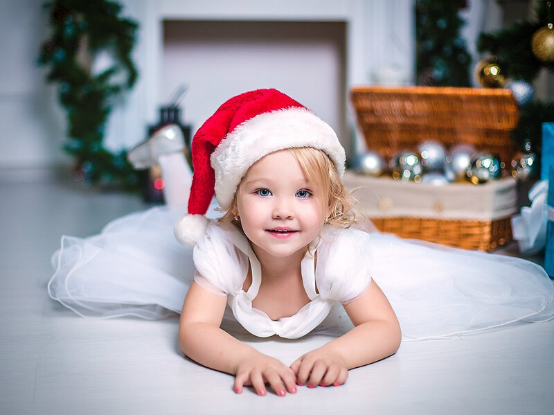 Child in Santa Hat — White, Festive, Winter, Photograph, Christmas Tree