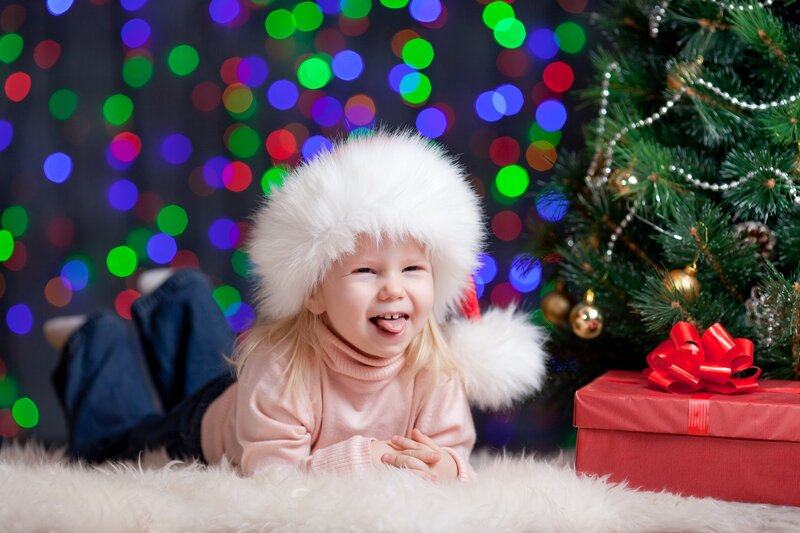 Child in Santa Hat — White, Festive, Winter