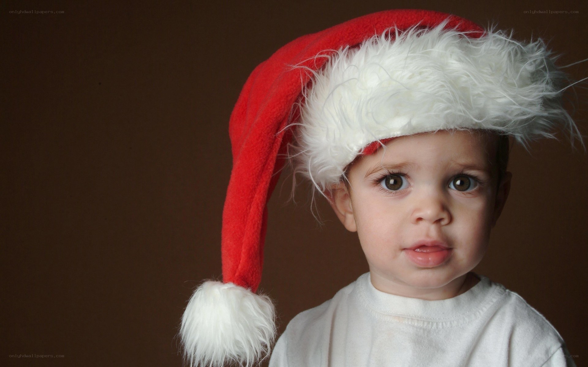 child in santa hat