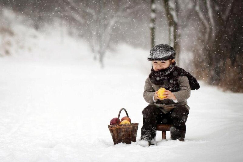 Child in Snow with Basket — White