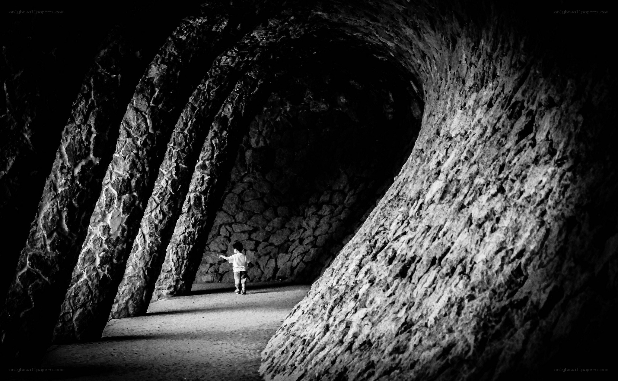 Child in stone tunnel