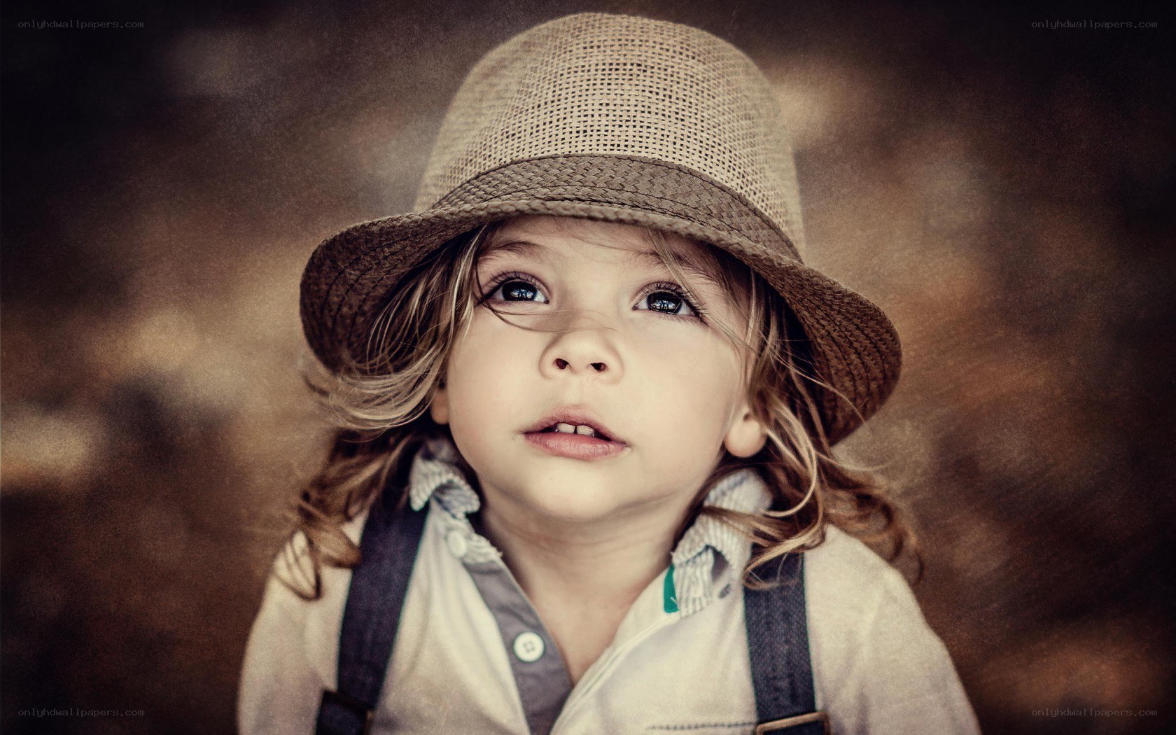child in straw hat