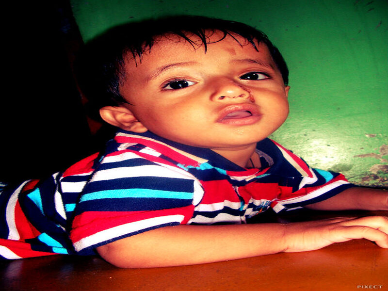 Child in Striped Shirt