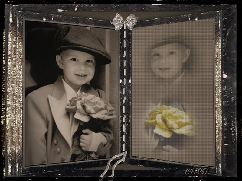 child in suit with flower