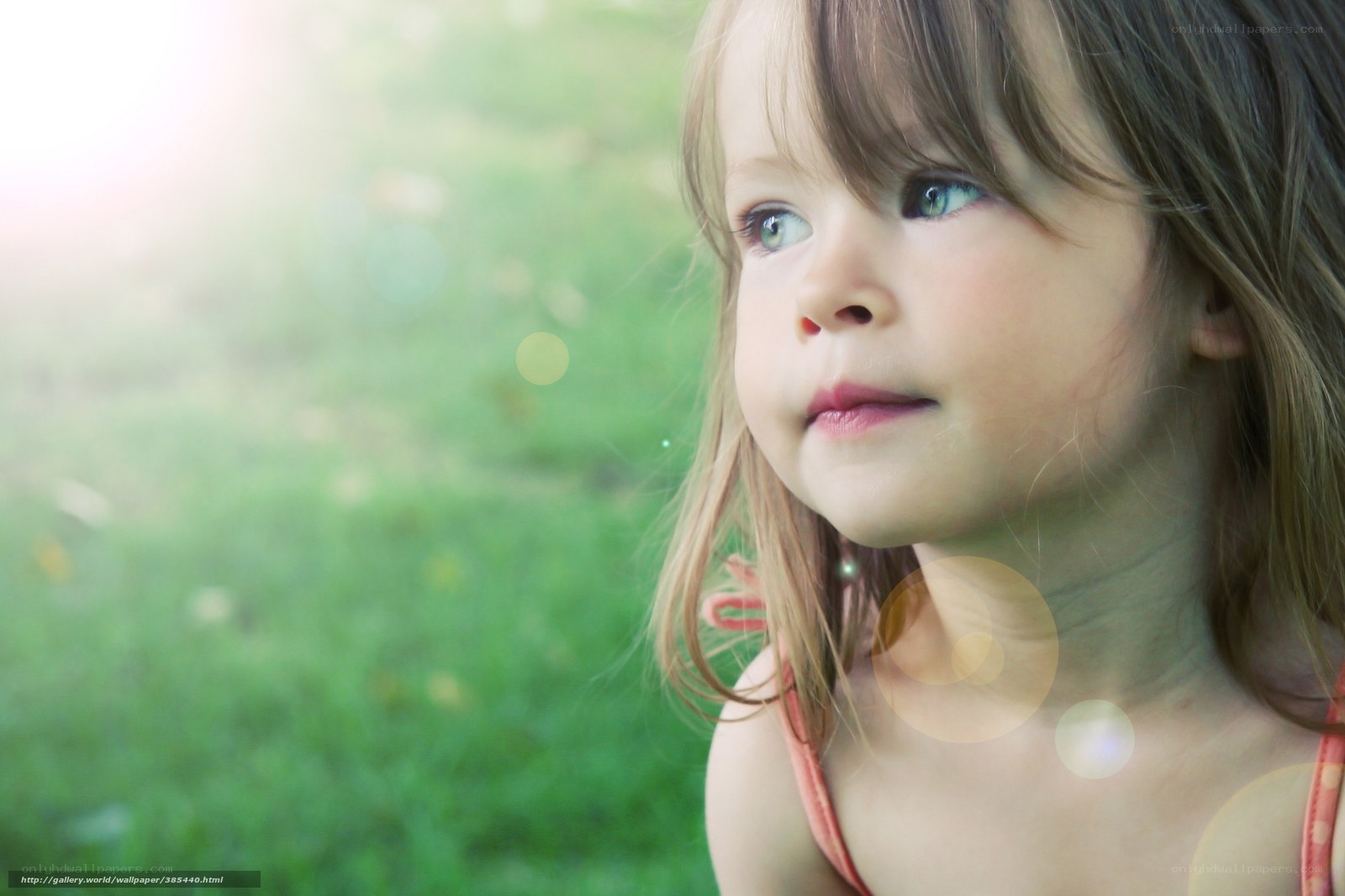 child in sunlit garden