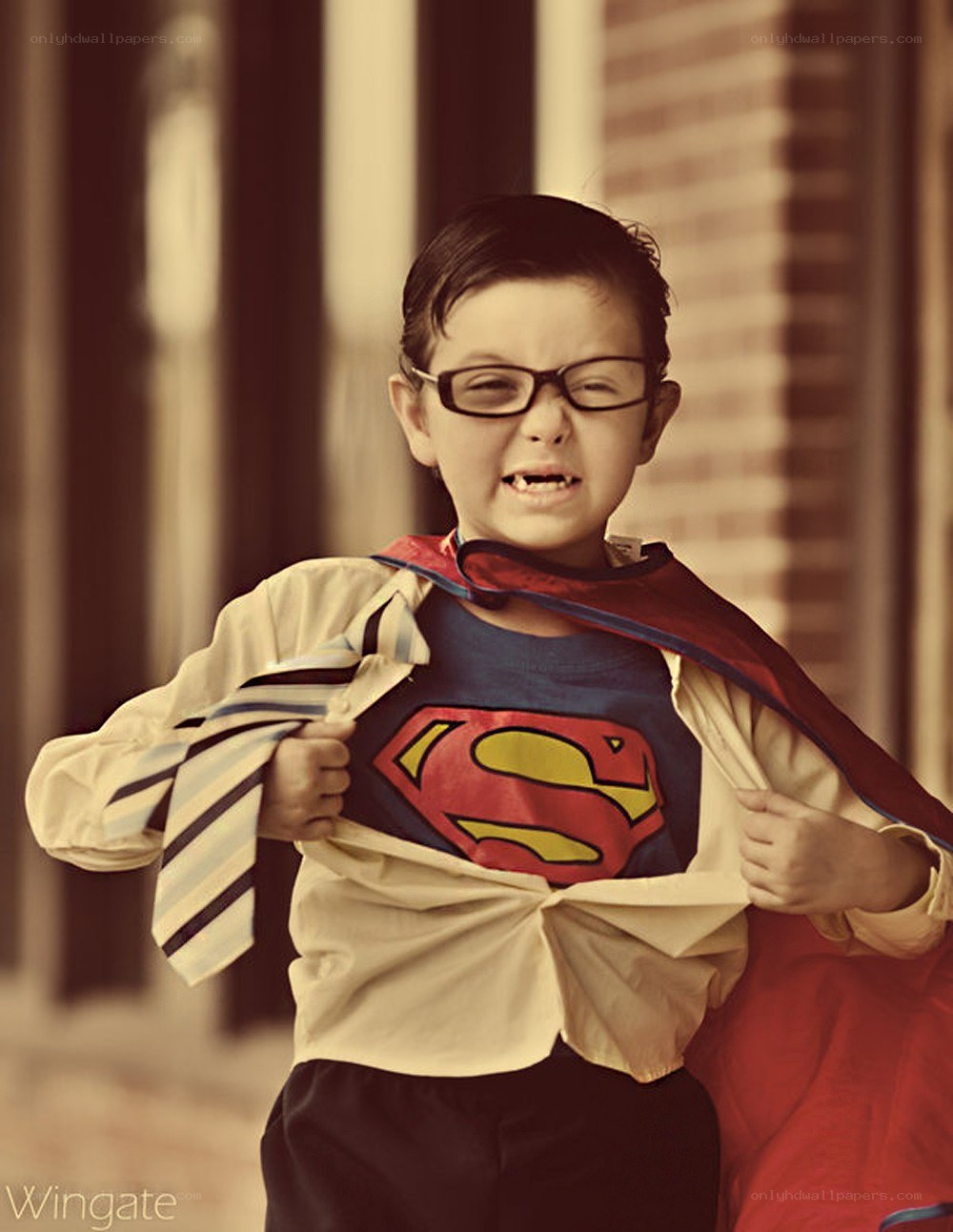 child in superman costume
