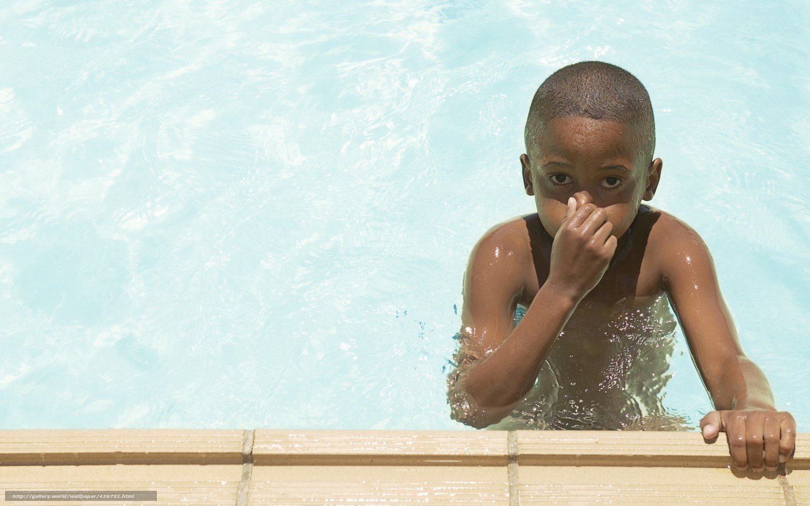 child in swimming pool