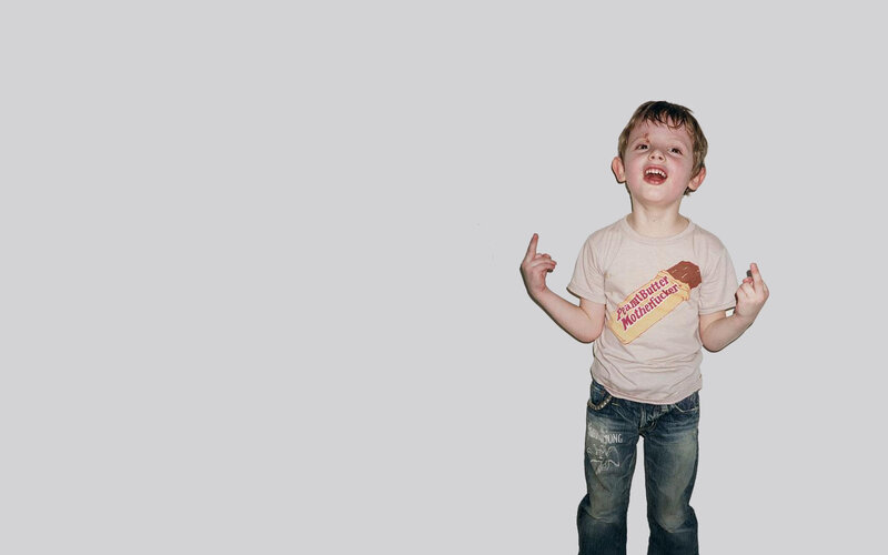 child in t-shirt with candy graphic