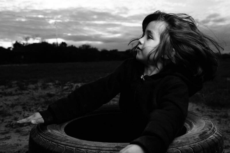 Child in Tire