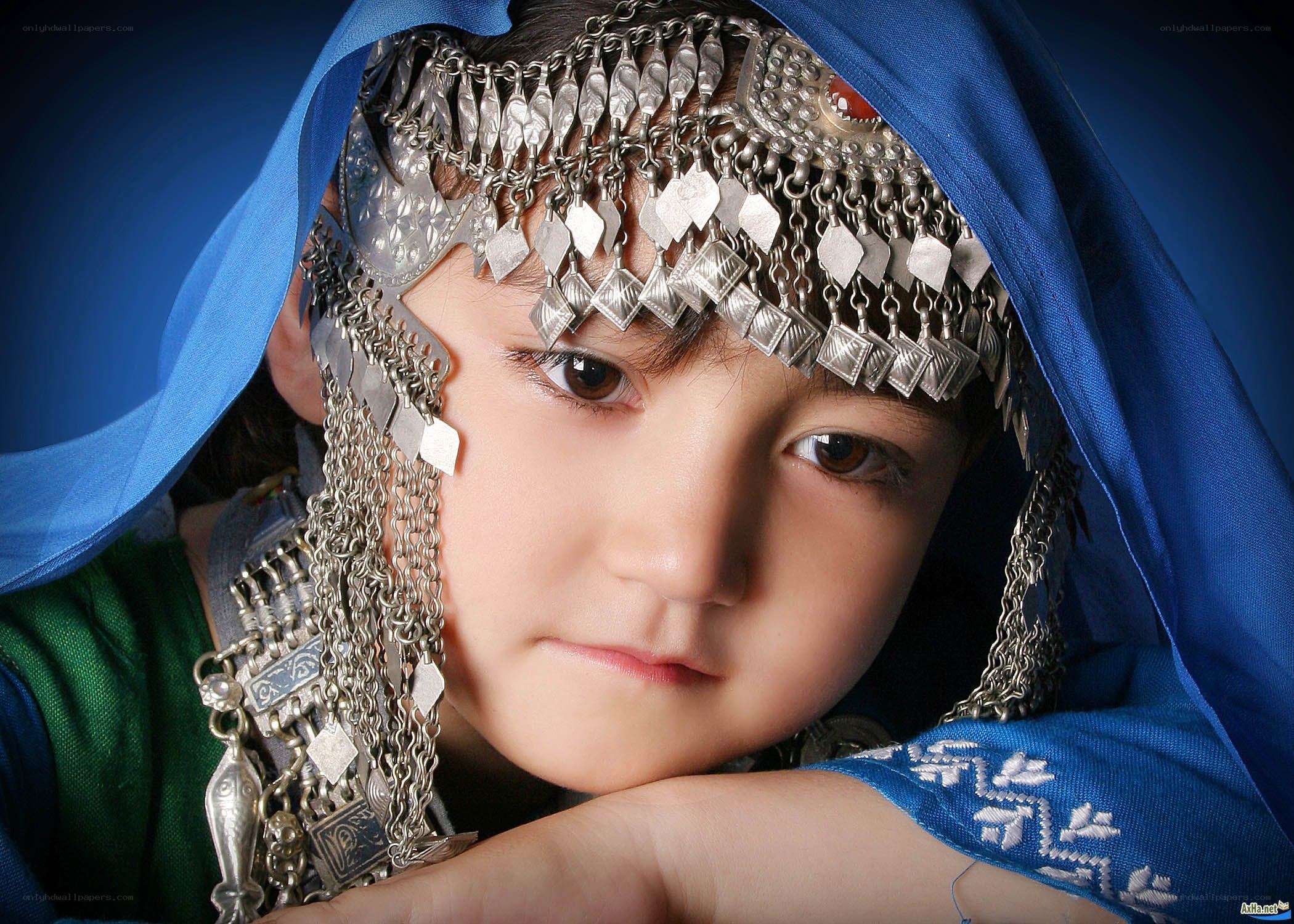 child in traditional headwear
