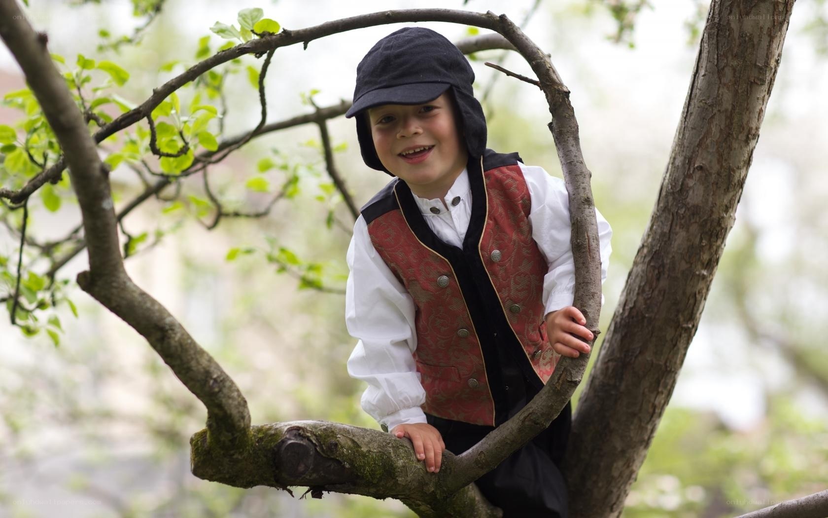 child in tree costume